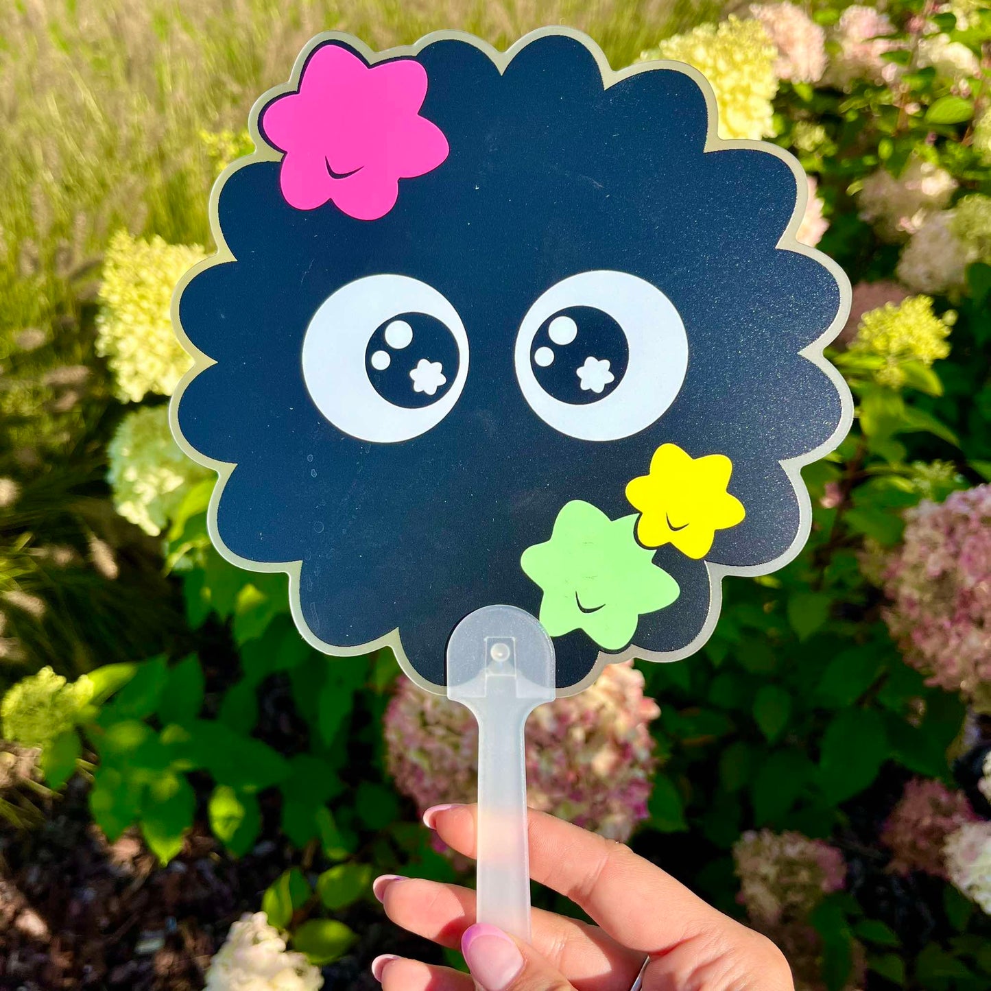 Fluffy black ball hand fan