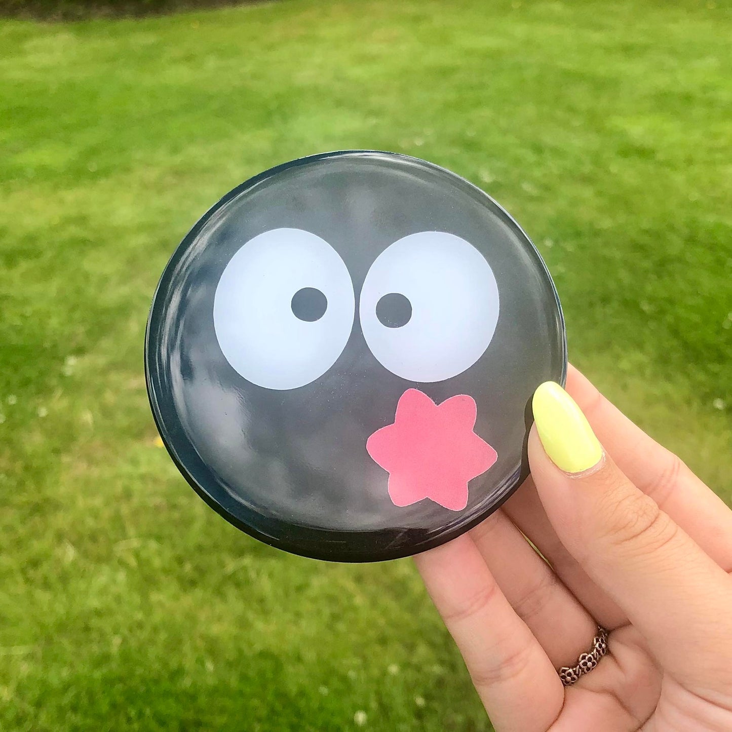 Black fluffy ball coaster